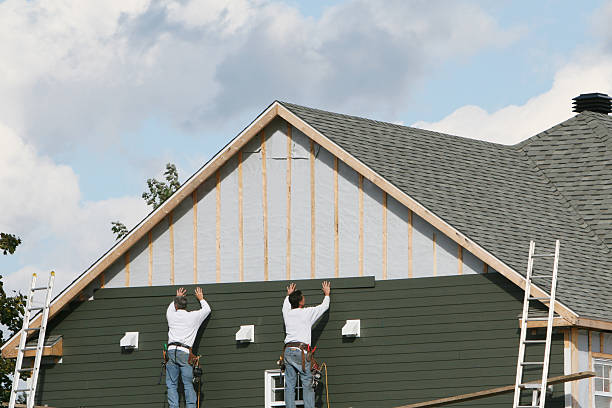 Professional Siding Repair technician working in Woodbury, PA
